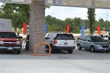 Vehicle Getting Fuel at the Downstream Q Store Gas Station